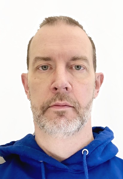 Processed passport photo with white background